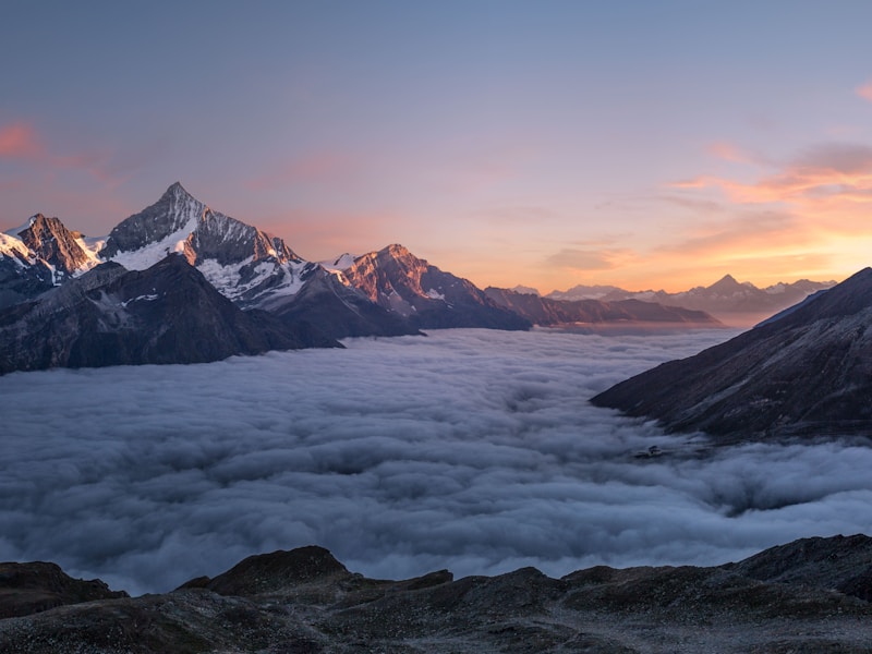 Mountain landscape with lake at sunset